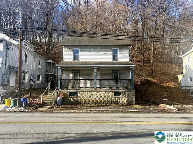 a view of a building with traffic signal