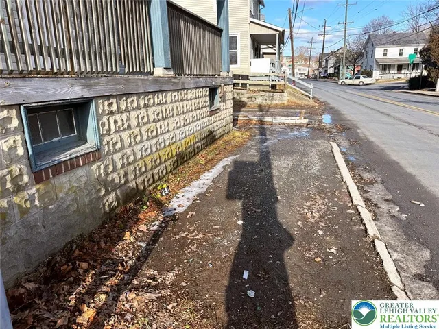 a view of a brick house with a door