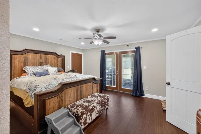a bathroom with a sink a toilet and a window