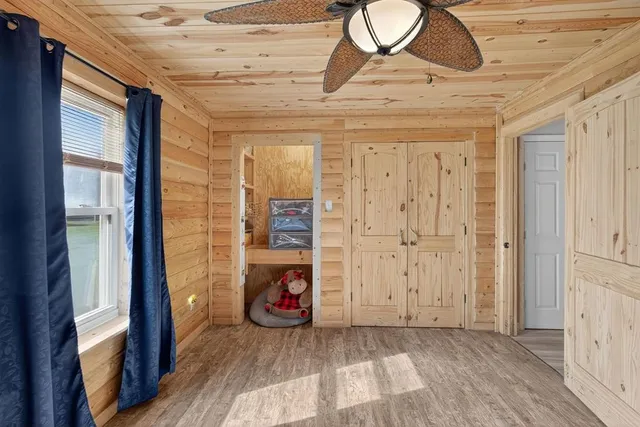 a bathroom with a sink a vanity and a mirror