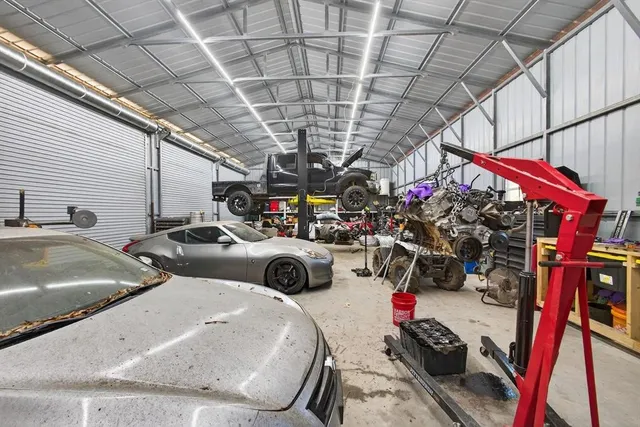 a kitchen with granite countertop cabinets stove and oven