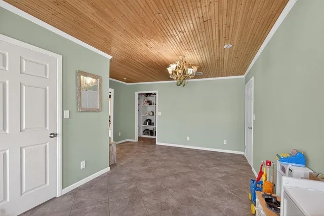 a view of a livingroom with furniture and a fireplace