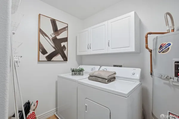 a kitchen with a refrigerator stove and a sink