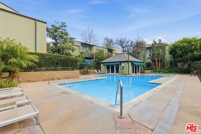 swimming pool with outdoor seating