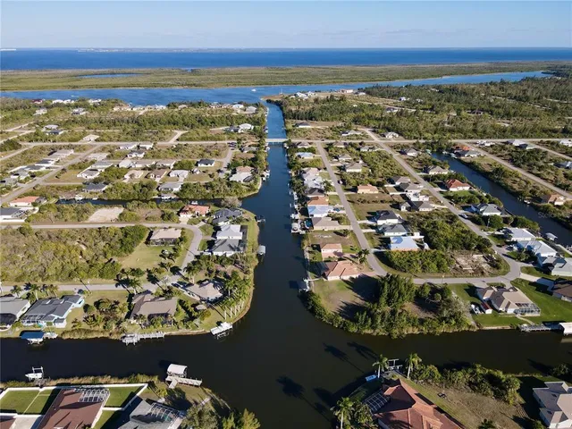 an aerial view of residential building with parking space