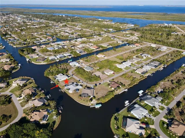 an aerial view of residential house with an ocean view