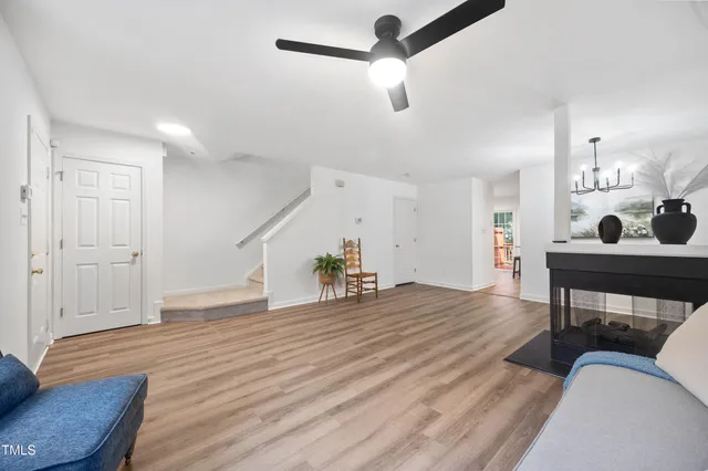 a view of a livingroom with furniture and wooden floor