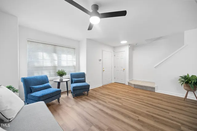 a bedroom with furniture and windows