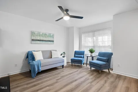 a bedroom with furniture and windows