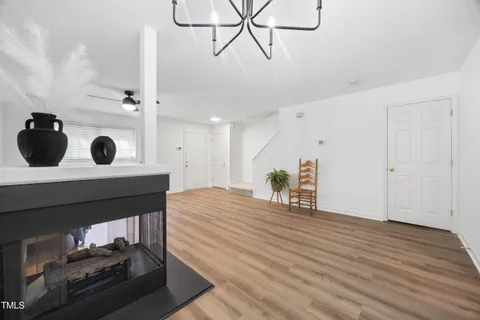 a view of a livingroom with furniture and window