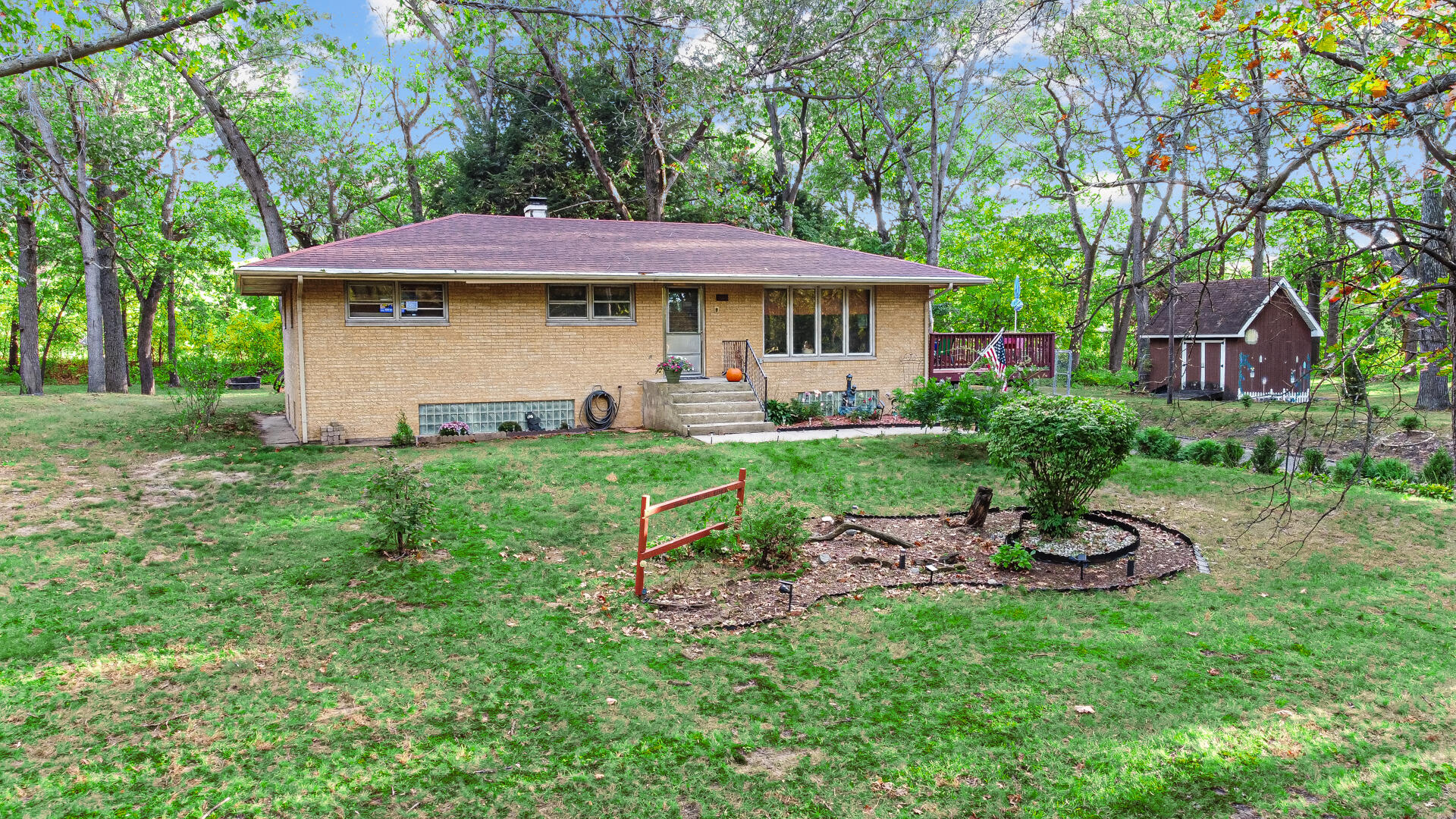 5001 Marquette Road Lake Station, IN 46405 - Photo 26 of 32 a view of a chair and table in backyard of the house