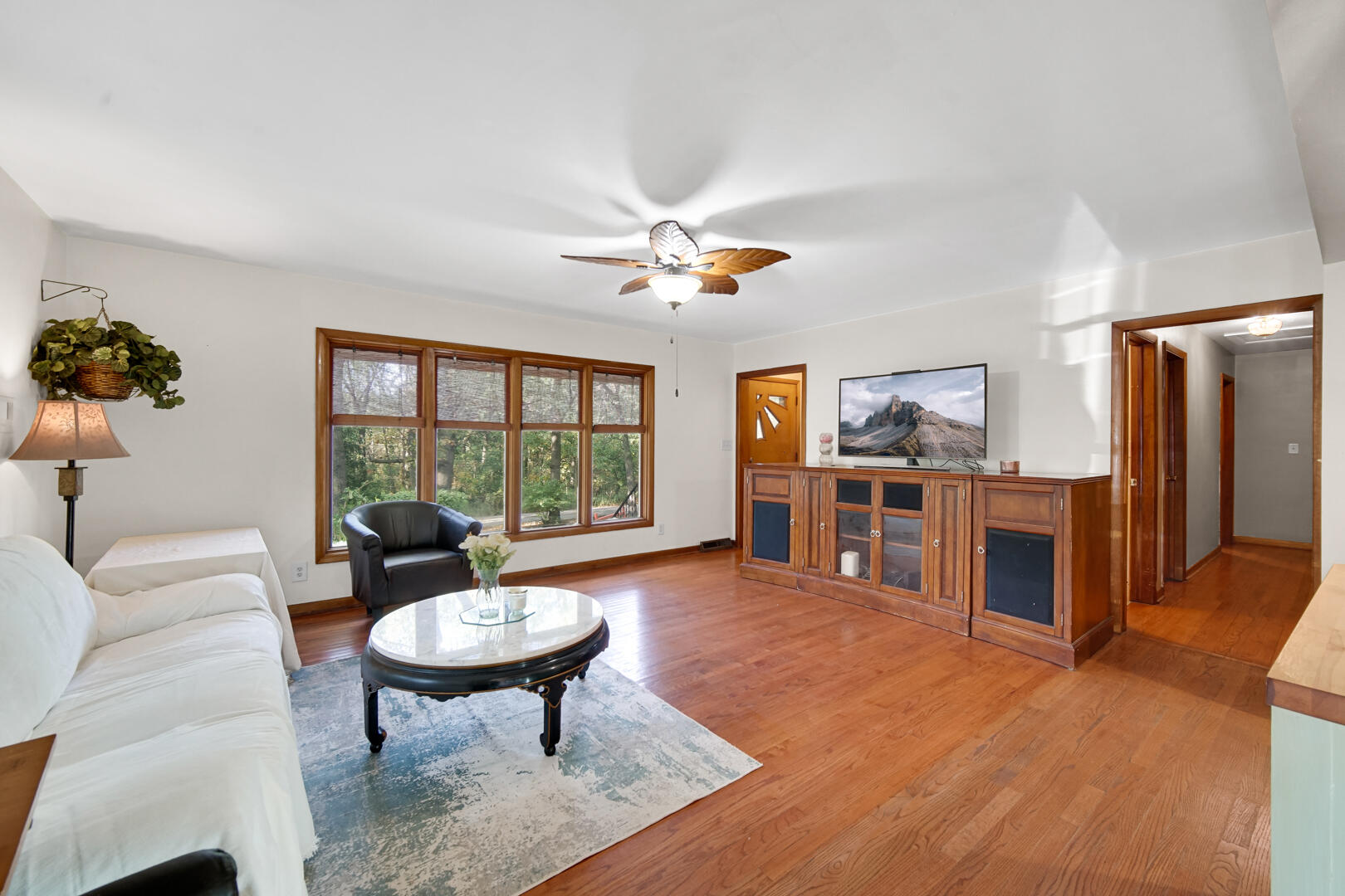 5001 Marquette Road Lake Station, IN 46405 - Photo 5 of 32 a living room with furniture and a fireplace