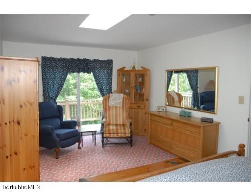 95 N Road Monroe, MA 01350 - Photo 18 of 22 a living room with furniture and a window
