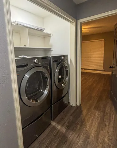 a utility room with dryer and washer