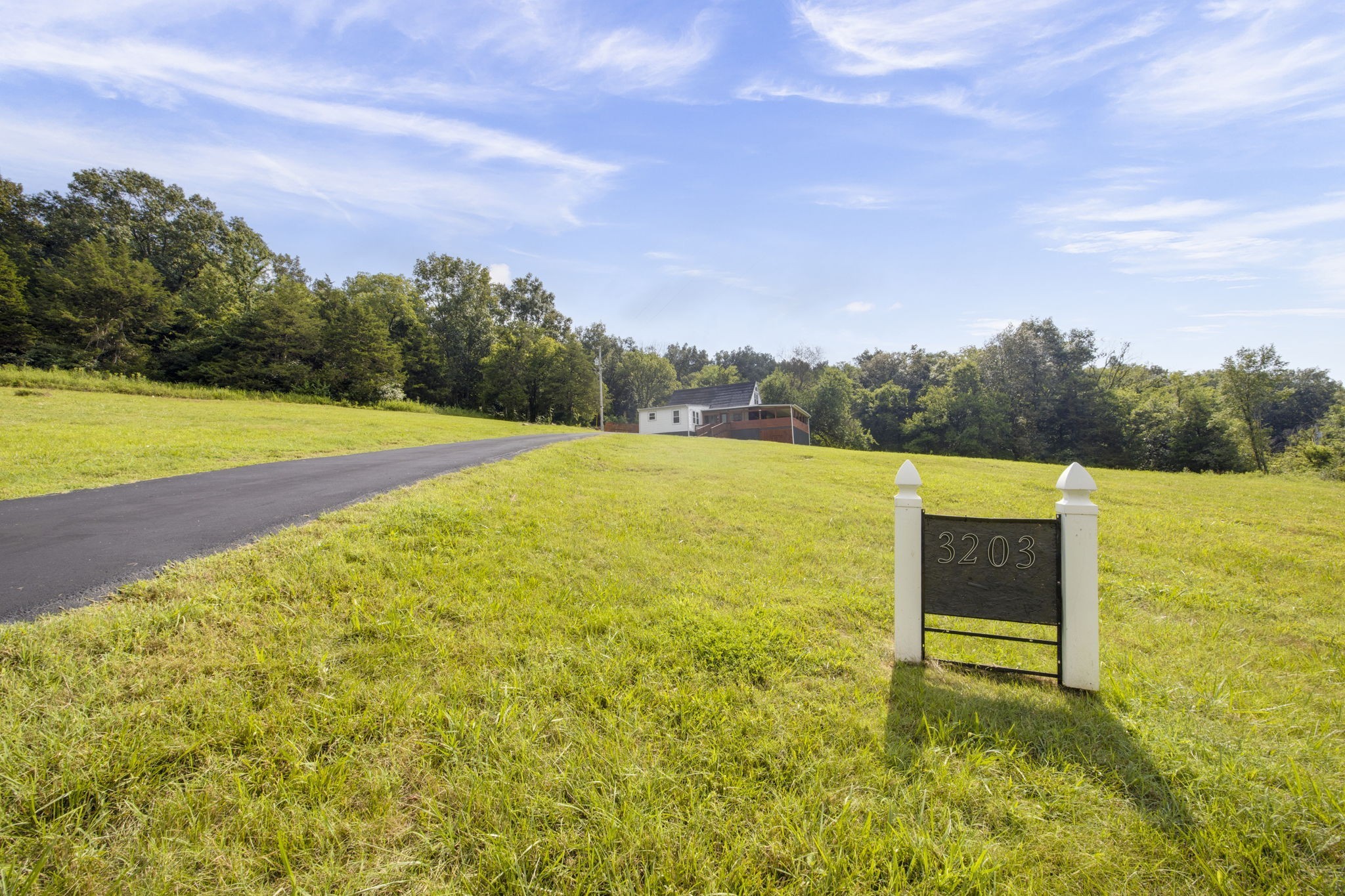 3203 Statesville Road Watertown, TN 37184 - Photo 1 of 56 a view of outdoor space and swimming pool