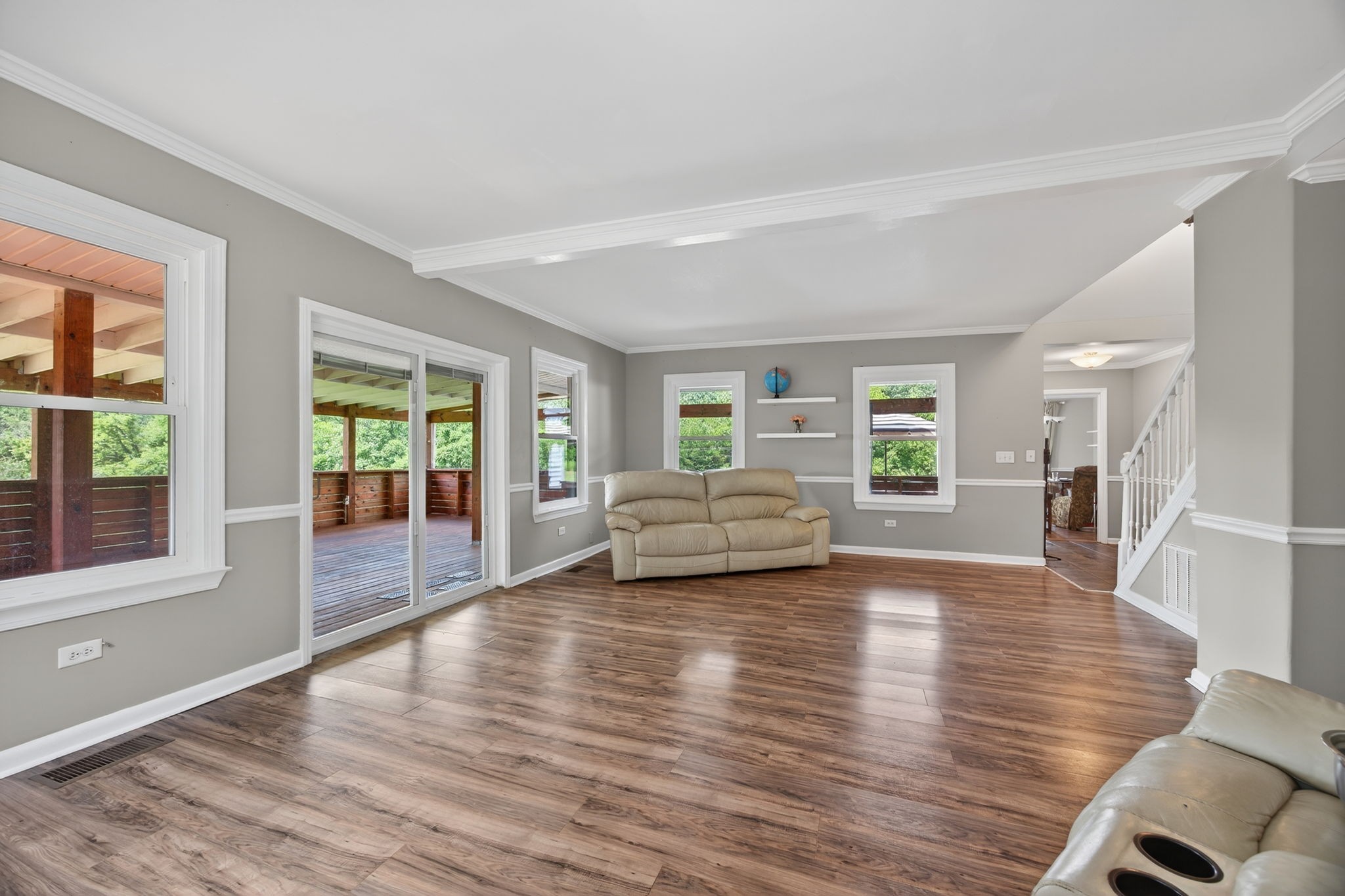 3203 Statesville Road Watertown, TN 37184 - Photo 19 of 56 a view of a livingroom with furniture wooden floor and windows