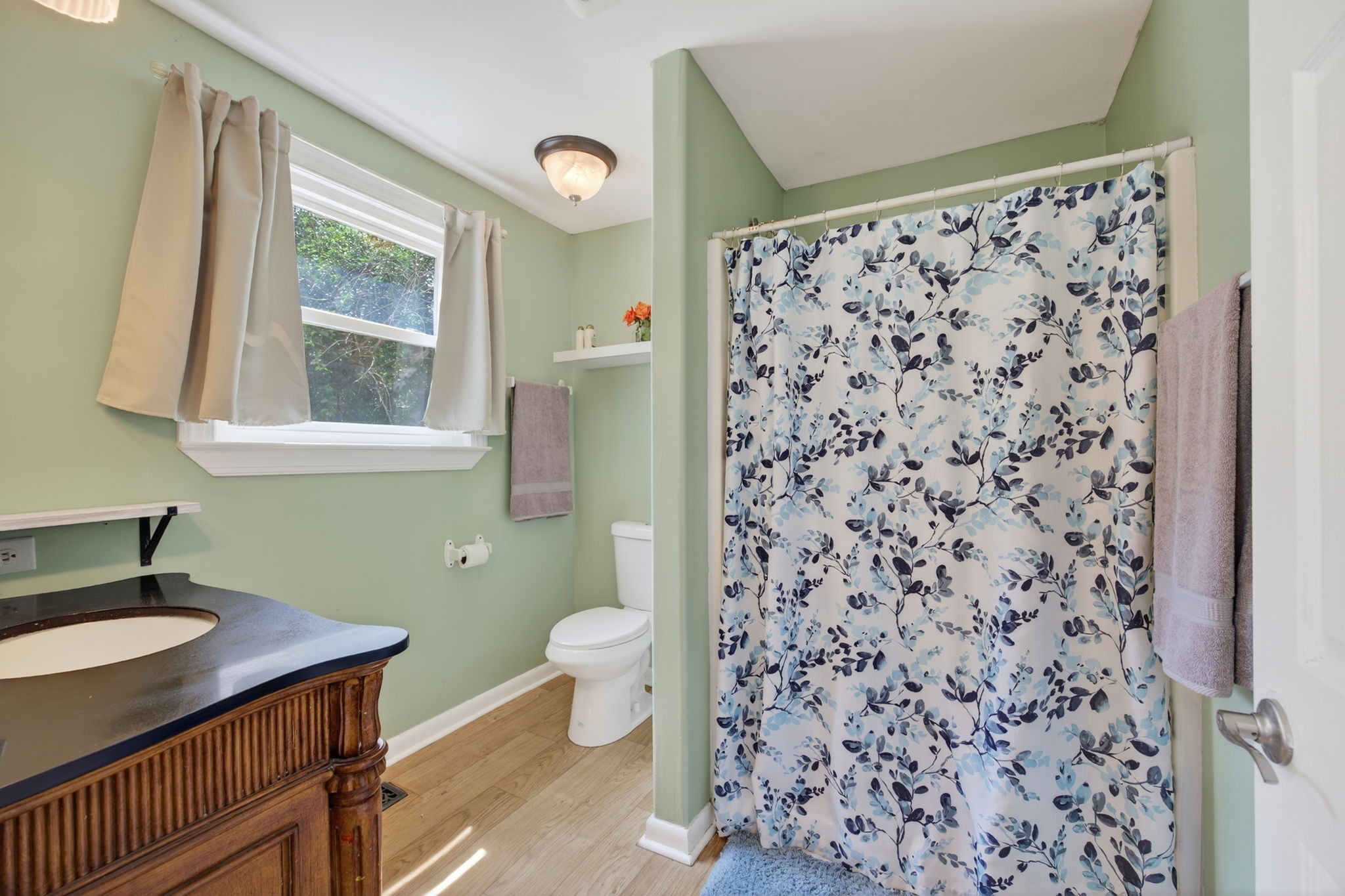 3203 Statesville Road Watertown, TN 37184 - Photo 23 of 56 a bathroom with a sink toilet and shower