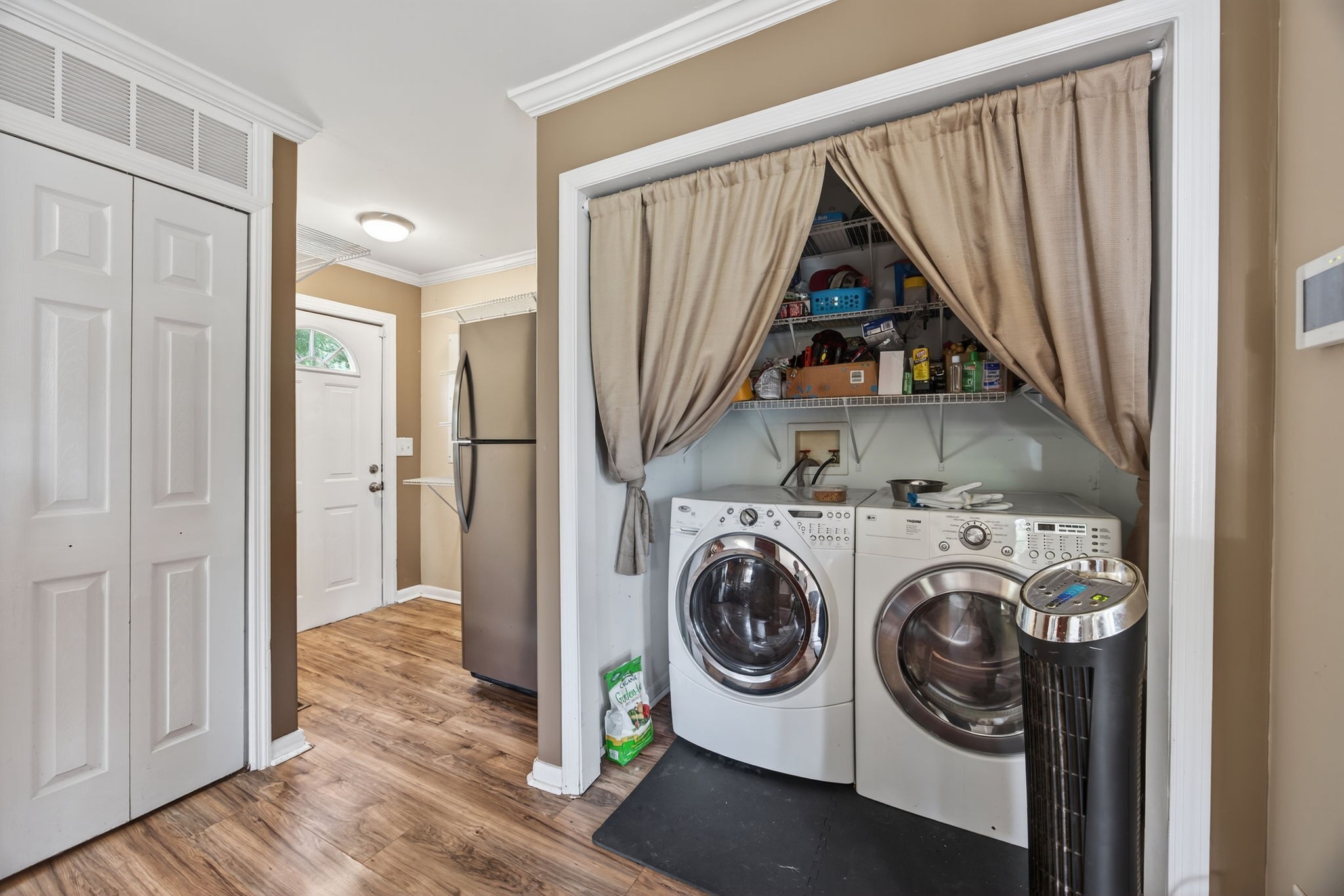 3203 Statesville Road Watertown, TN 37184 - Photo 32 of 56 a view of a hallway with washer and dryer