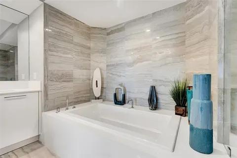 a view of a city with tall buildings