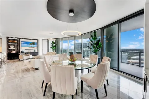 a bedroom with a bed and a table