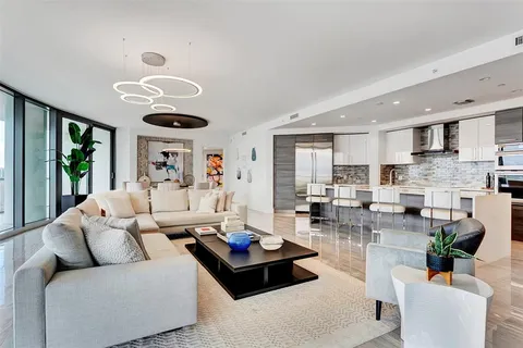 a outdoor living space with patio furniture and garden view