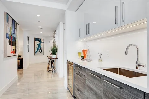 a view of swimming pool with outdoor seating