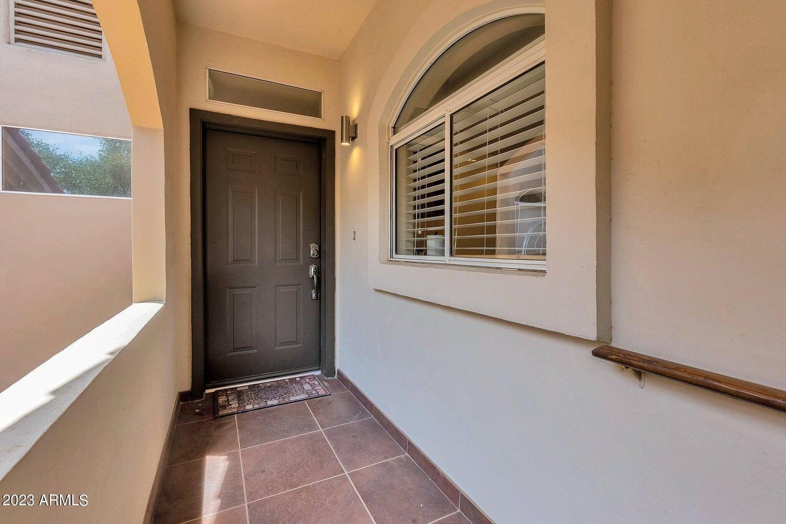 8653 East Royal Palm Road, Unit 2014 Scottsdale, AZ 85258 - Photo 3 of 4 a view of an empty room with a window