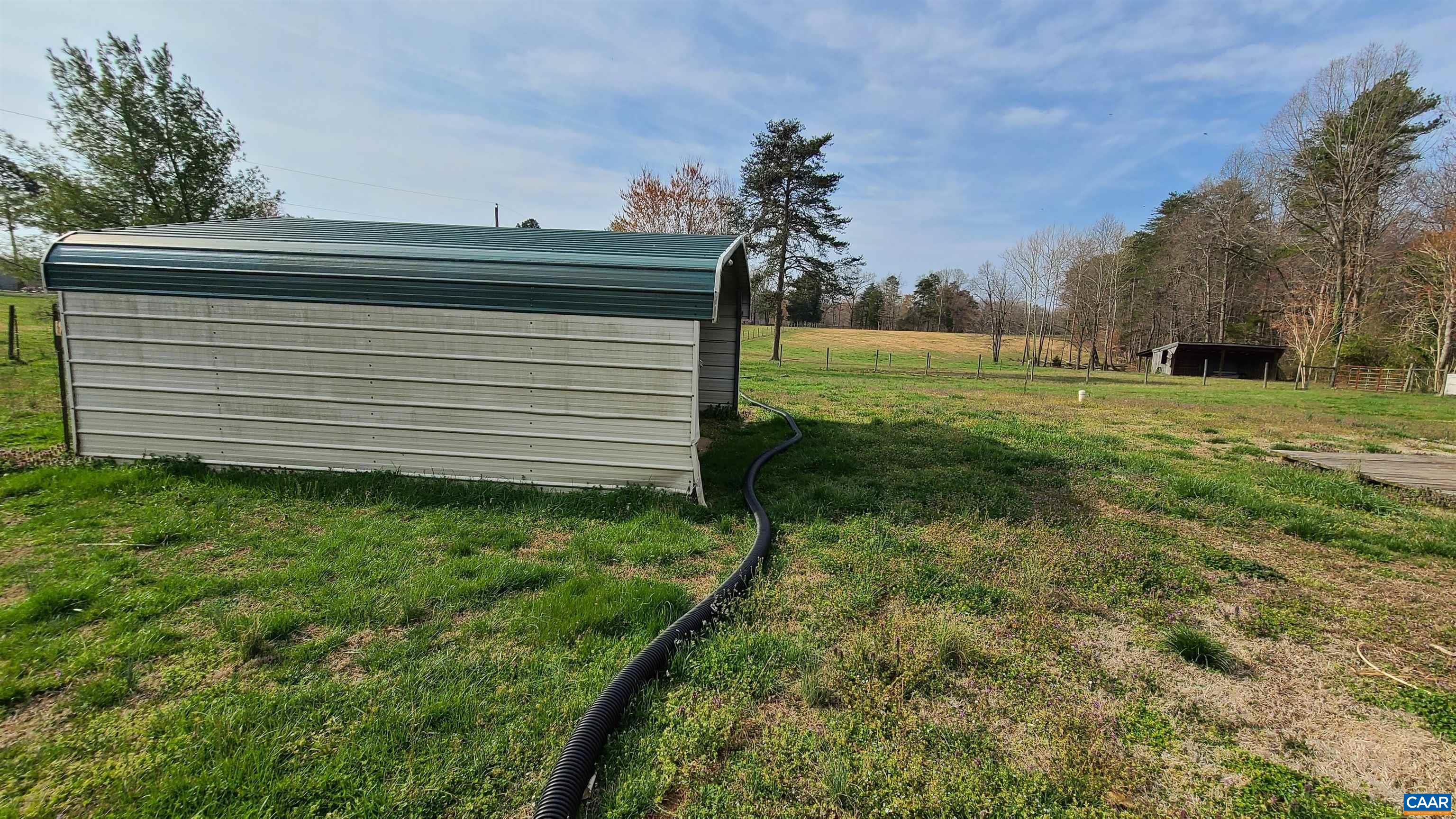 240 Lee Wayside Road Buckingham, VA 23921 - Photo 21 of 42 a view of a backyard with pathway