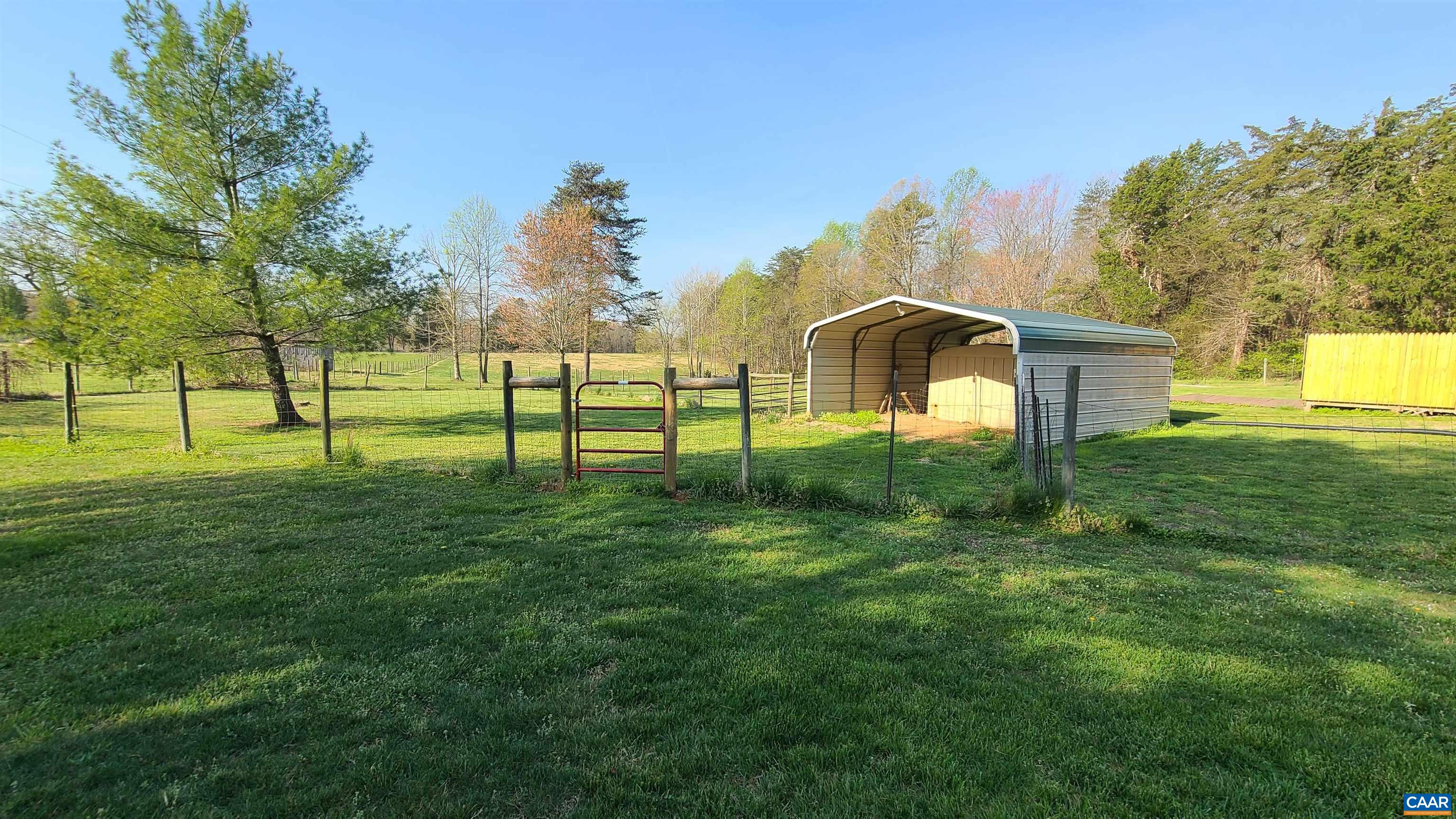 240 Lee Wayside Road Buckingham, VA 23921 - Photo 29 of 42 a front view of a house with a yard