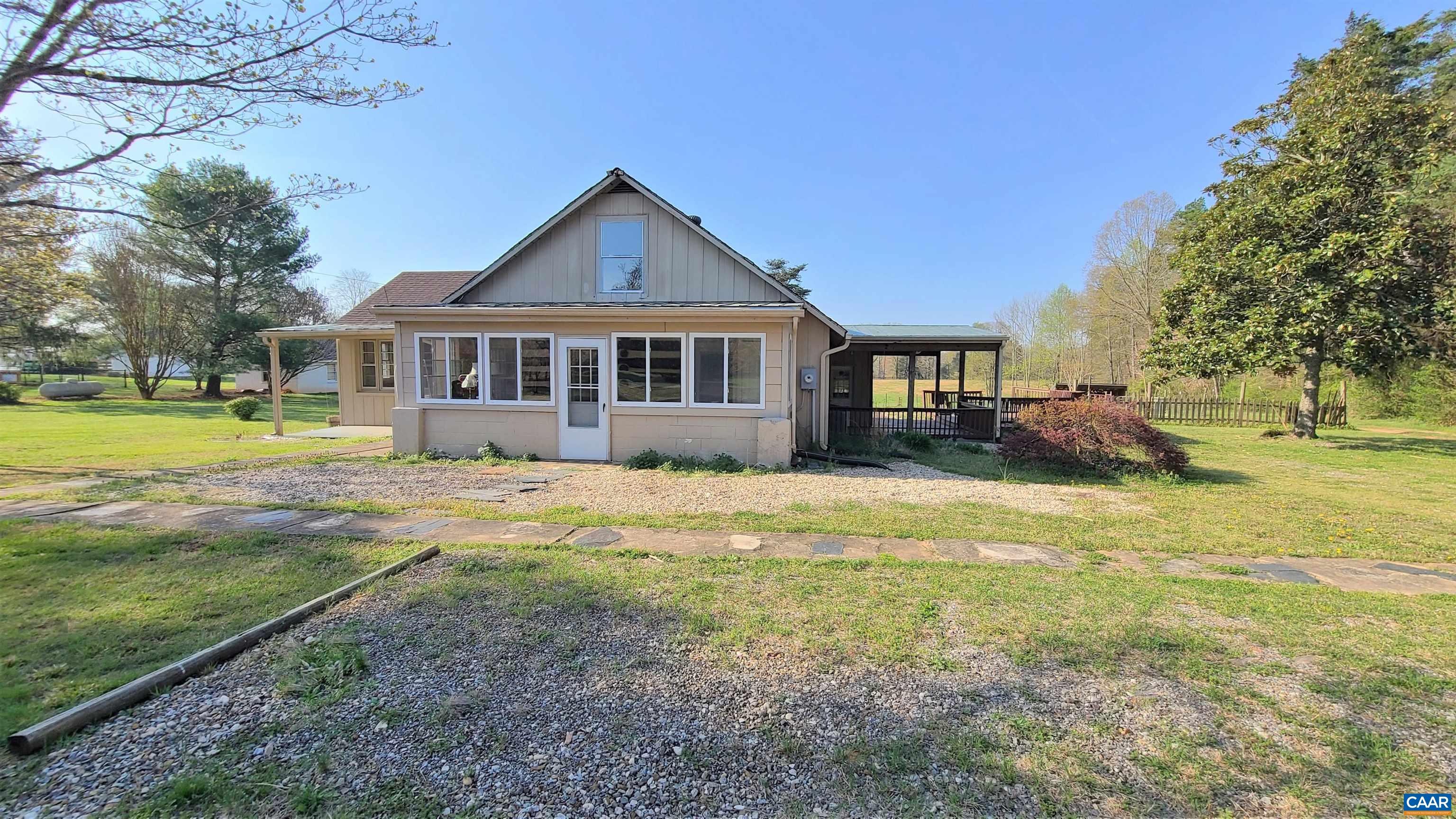 240 Lee Wayside Road Buckingham, VA 23921 - Photo 32 of 42 a front view of a house with a yard