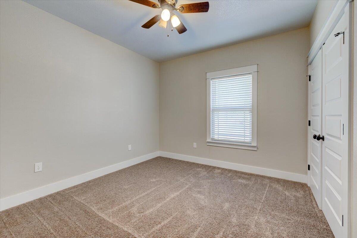 3956 Painter Branch Road Crestview, FL 32539 - Photo 15 of 28 a view of an empty room with a window