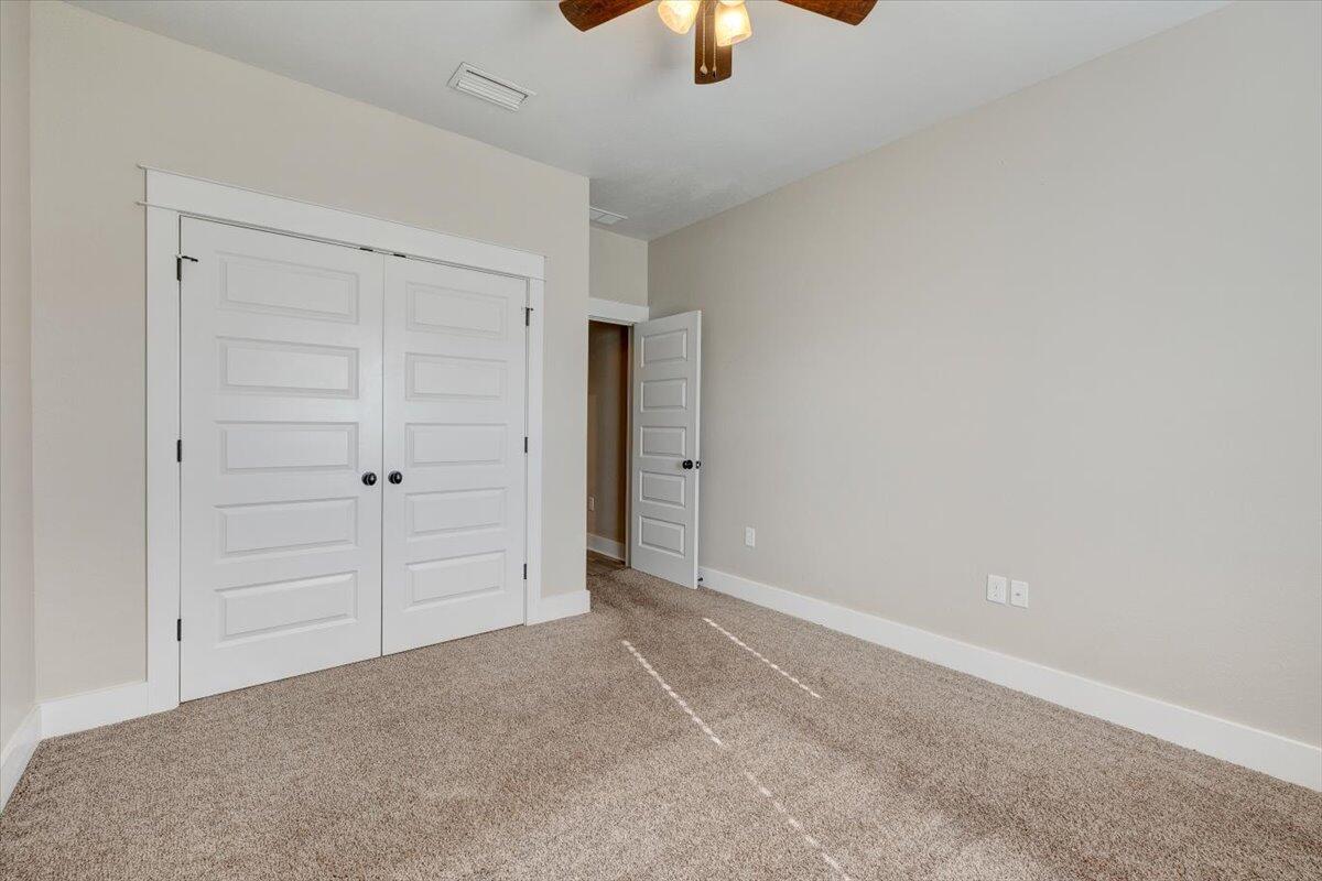 3956 Painter Branch Road Crestview, FL 32539 - Photo 18 of 28 an empty room with closet area