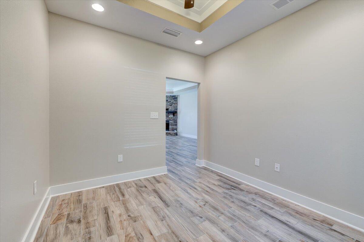 3956 Painter Branch Road Crestview, FL 32539 - Photo 21 of 28 wooden floor in an empty room