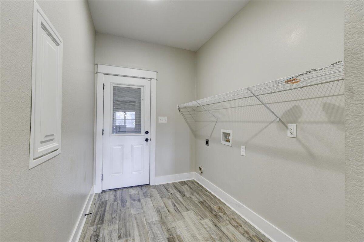 3956 Painter Branch Road Crestview, FL 32539 - Photo 25 of 28 a view of a room with wooden floor