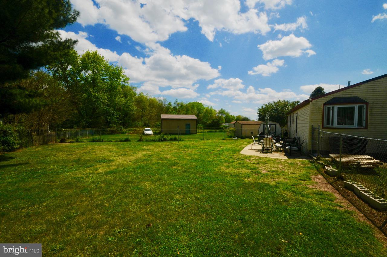 710 Blue Bell Road Williamstown, NJ 08094 - Photo 19 of 19 a view of a backyard with sitting area