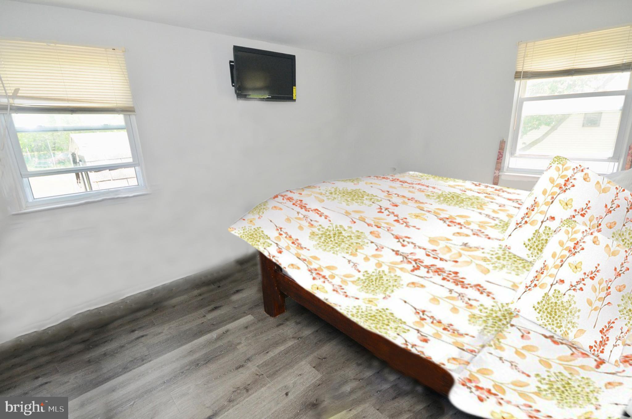 710 Blue Bell Road Williamstown, NJ 08094 - Photo 5 of 19 a bedroom with a bed and a window