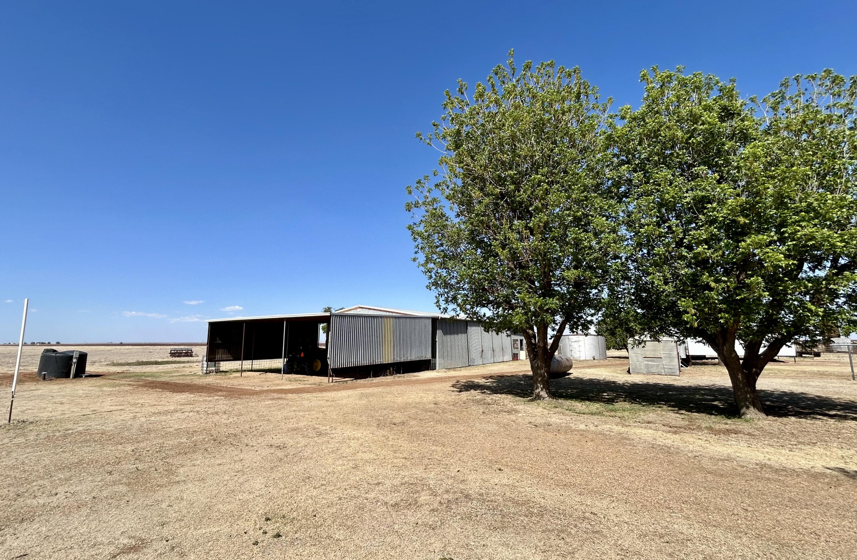 2101 Farm To Market 97 Lockney, TX 79241 - Photo 33 of 35 a view of a house with a yard
