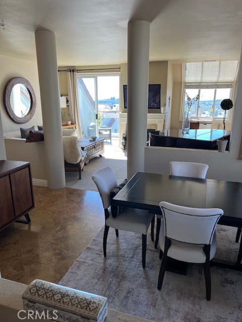 46 Los Cabos Dana Point, CA 92629 - Photo 16 of 37 a living room with furniture and a large window