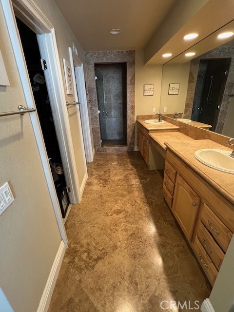 46 Los Cabos Dana Point, CA 92629 - Photo 18 of 37 a bathroom with sink shower and mirror