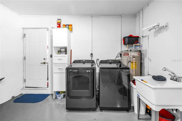 a storage room with washer and dryer