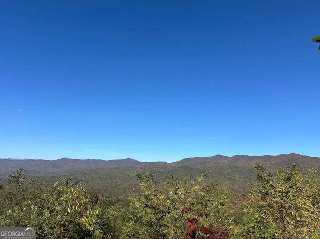 a view of mountains and valleys
