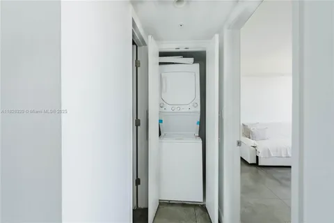 a balcony with chairs and wooden floor