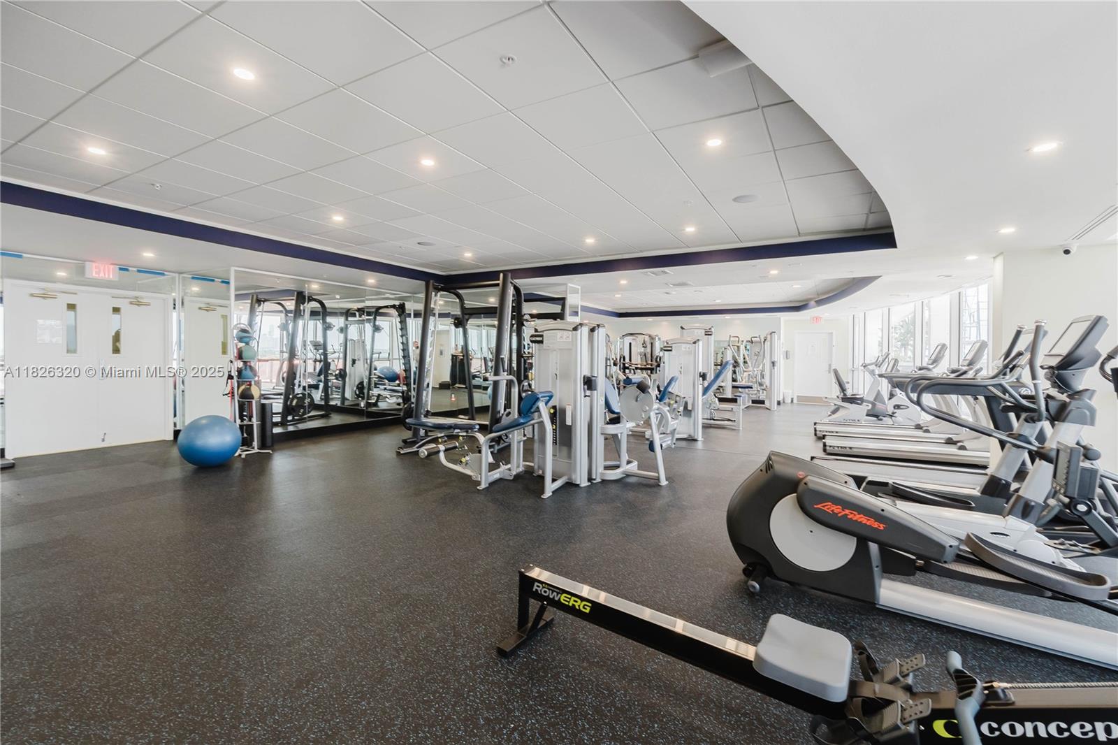 1900 Sunset Harbour Drive, Unit 703 Miami Beach, FL 33139 - Photo 18 of 22 a view of a room with gym equipment
