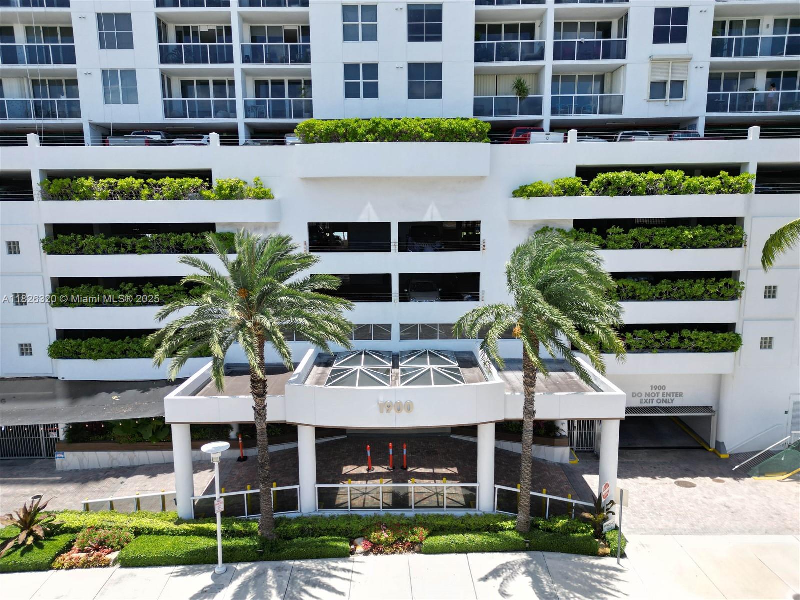 1900 Sunset Harbour Drive, Unit 703 Miami Beach, FL 33139 - Photo 19 of 22 a front view of building with yard
