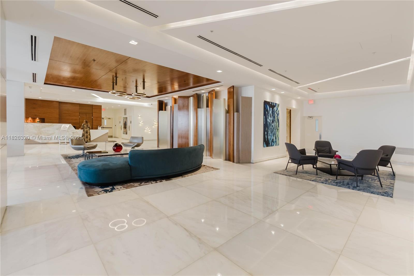 1900 Sunset Harbour Drive, Unit 703 Miami Beach, FL 33139 - Photo 22 of 22 a living room with furniture and a flat screen tv