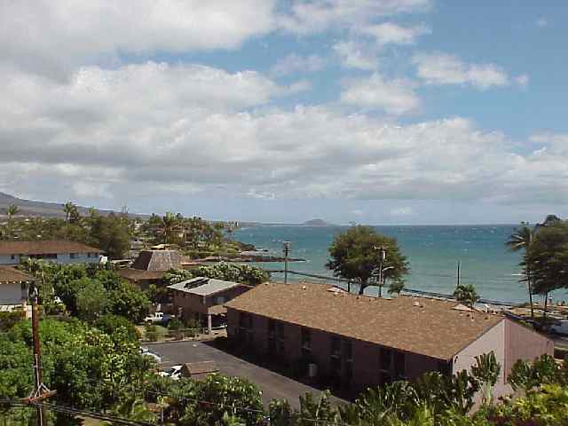 1993 South Kihei Road, Unit 615 Kihei, HI 96753 - Photo 1 of 16 a view of a house with a yard and lake view