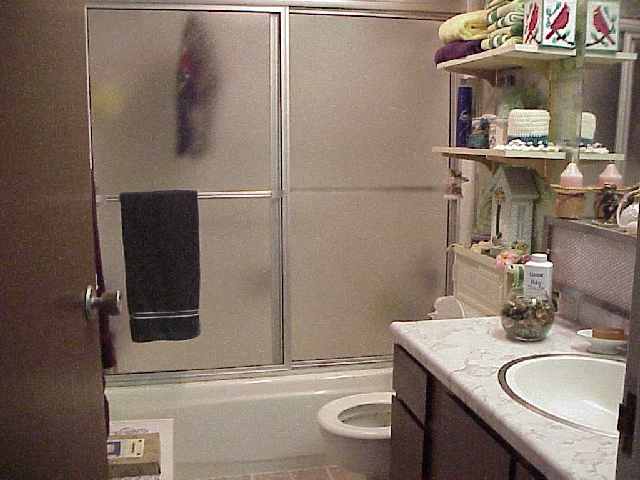1993 South Kihei Road, Unit 615 Kihei, HI 96753 - Photo 14 of 16 a bathroom with a granite countertop sink and a mirror