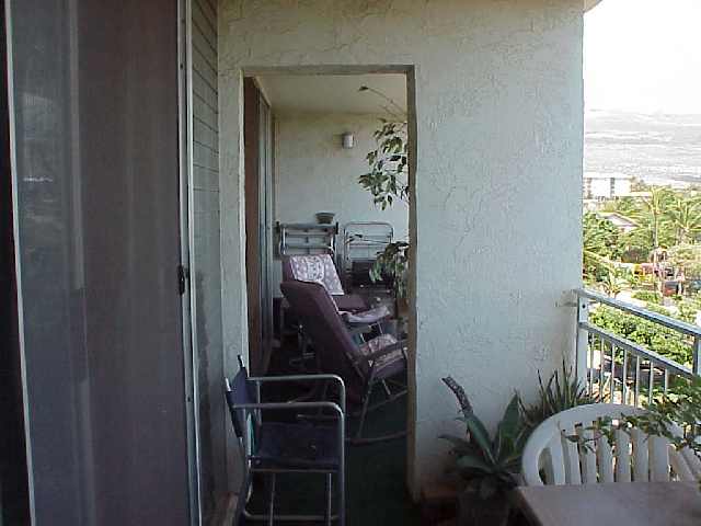 1993 South Kihei Road, Unit 615 Kihei, HI 96753 - Photo 4 of 16 a view of an entryway with wooden floor