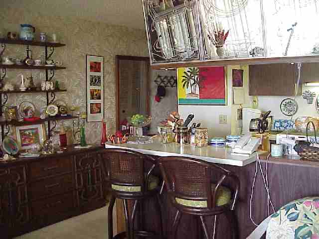 1993 South Kihei Road, Unit 615 Kihei, HI 96753 - Photo 9 of 16 a kitchen with a sink and cabinets