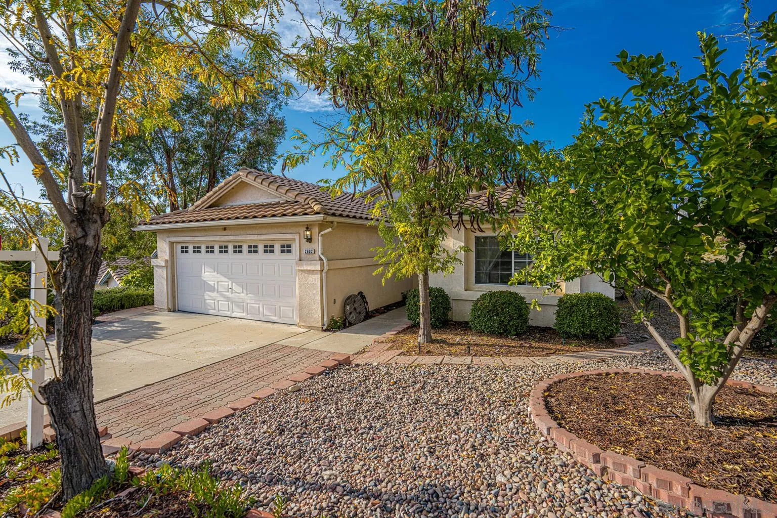 2602 Columbine Road Alpine, CA 91901 - Photo 1 of 38 a front view of a house with a yard